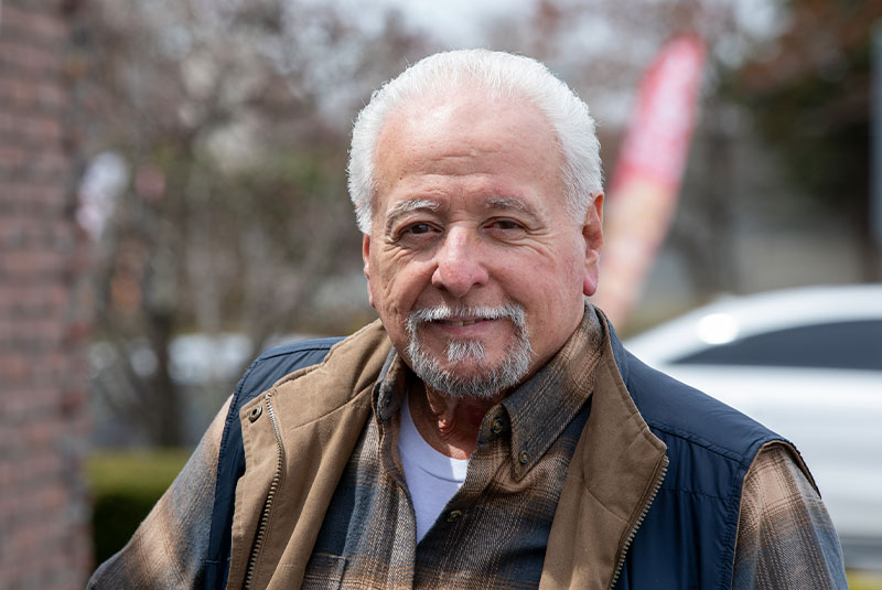 Gitlin dental group patient smiling outside