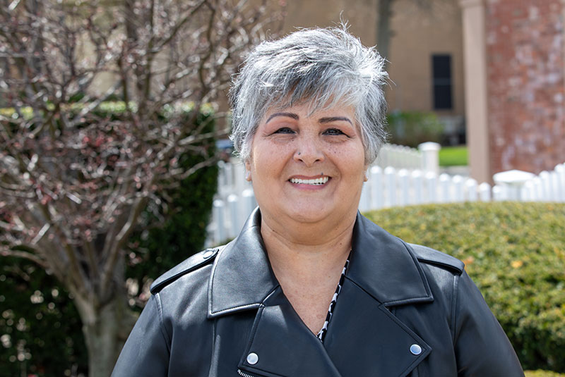 Gitlin dental group patient smiling outside